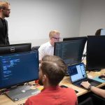 Business team in the USA collaborating on a custom software project with trust and transparency